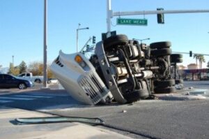 semi-truck rollover accident in the middle of an intersection