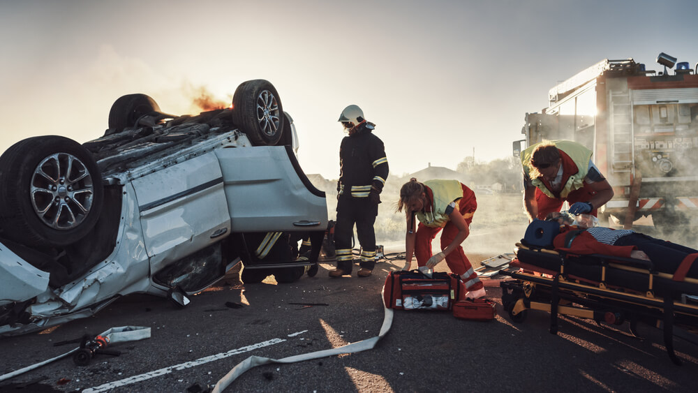 Emergency responders at scene of fatal car crash – contact a fatal car accident lawyer in Greensboro, NC for legal help.